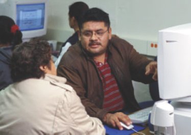 graphic of man sitting at a computer